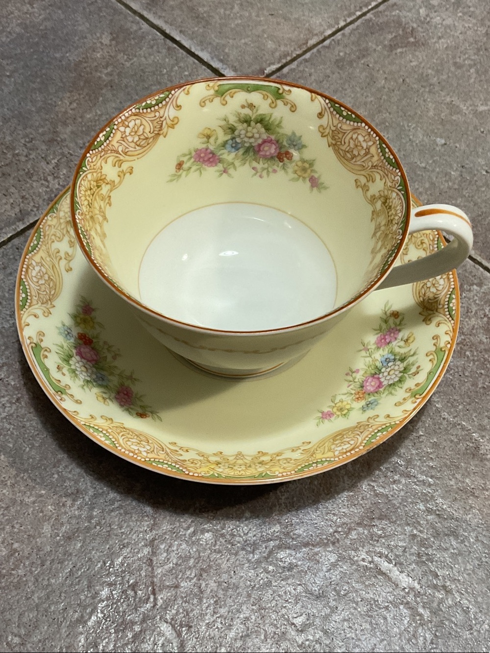 Noritake Yellow Floral China Teacup and Saucer with Gold Trim